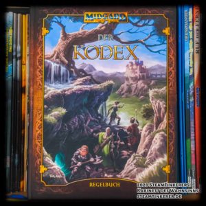 This picture shows the front cover of "Der Kodex", the Core Rulebook of the 5th edition of MIDGARD.