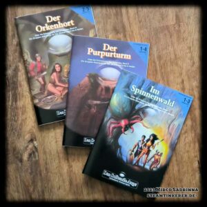 Die drei Abenteuer der "Orkland-Trilogie": "Im Spinnenwald", "Der Purpurturm" und "Der Orkenhort".